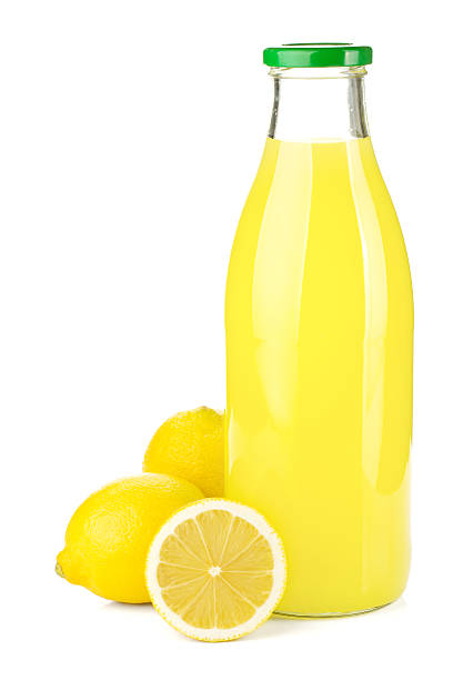 istock Bottle of lemon juice and fresh lemons 470021044