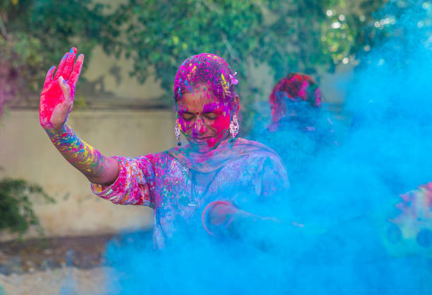 istock Indian Girl Celebrating Holi 470021346