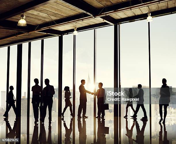 Silhouette Businesspeople Entering Office Building Stock Photo - Download Image Now - Business Person, Business, Walking