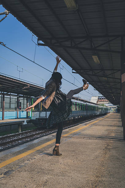 istock Pretty girl posing in a metro station 470022196