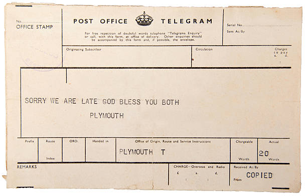 Vintage Telegram Old British Telegram from the mid Twentieth Century. telegram machine photos stock pictures, royalty-free photos & images