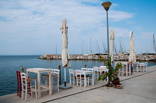 istock greek tavern at the harbour 470026407