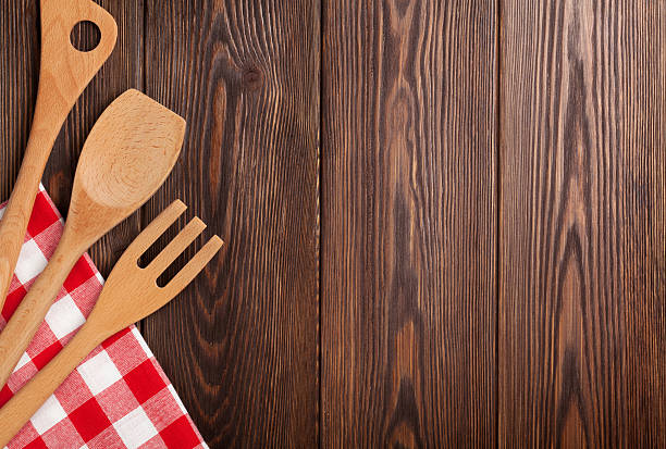 istock Kitchen cooking utensils over wooden table 470027516