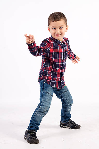 kleine junge tanzen - human hair ethnic little boys dancing stock-fotos und bilder