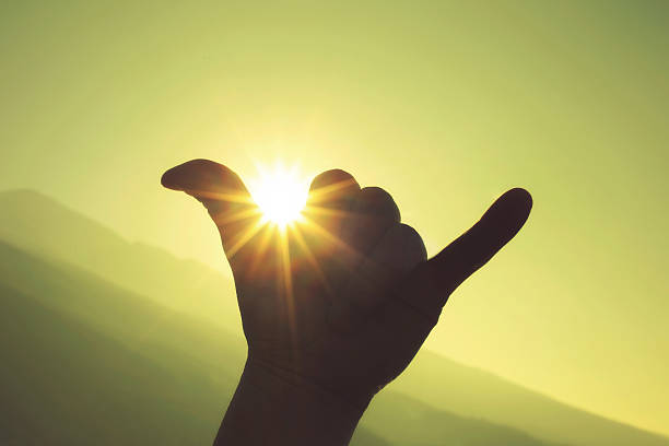 istock youth culture hand gesture at sunset 470028770