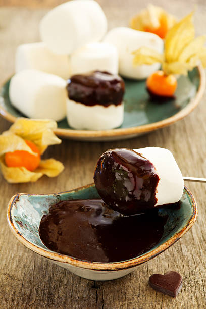 istock marshmallow with shkoladnym sauce. 470031604
