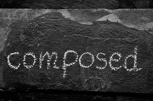 istock The word COMPOSED written with chalk on black stone. 470032966