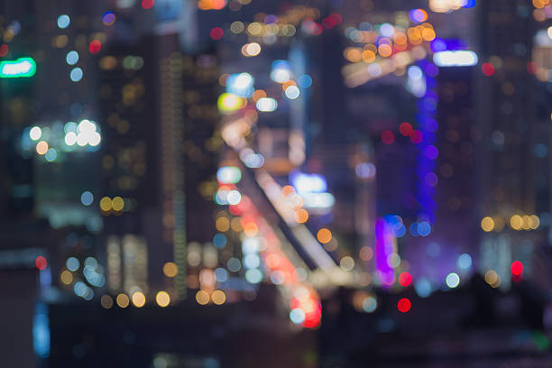 istock View of cityscape  night lights blurred bokeh background 470035424