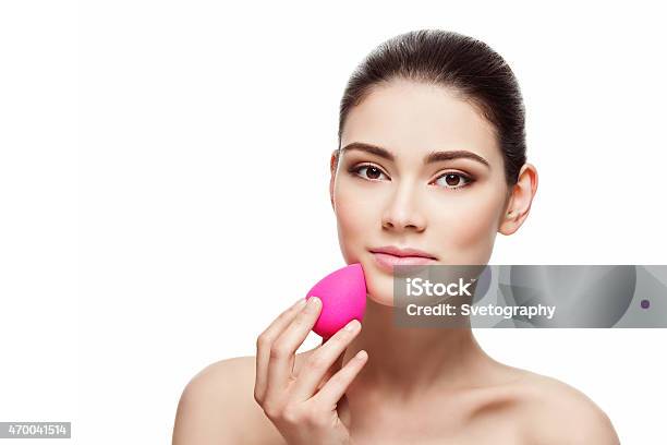 Girl With Beauty Blender Sponge Stock Photo - Download Image Now - 2015, Adult, Aging Process