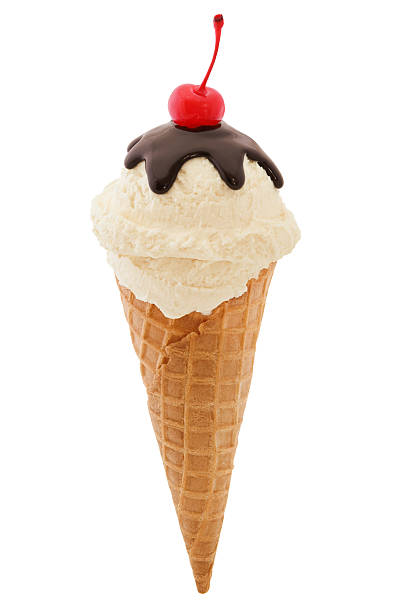 Vanilla Sundae Ice Cream Cone Vanilla Sundae Ice Cream Cone with hot fudge and cherry on top isolated on white time period stock pictures, royalty-free photos & images