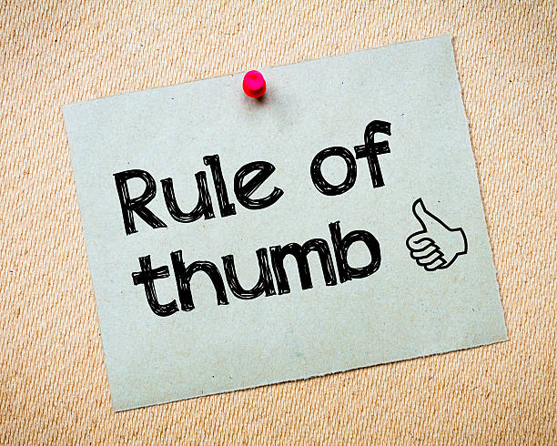 Rule of Thumb Rule of Thumb Message. Recycled paper note pinned on cork board. Concept Image thumb stock pictures, royalty-free photos & images