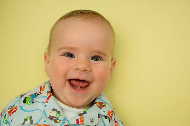 happy baby smiling - mensentong stockfoto's en -beelden