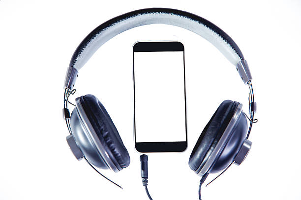 istock phone and headphones on a white background 470044300