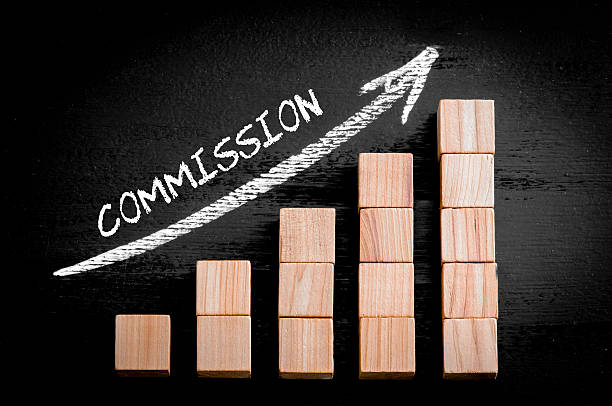 istock Word Commission on ascending arrow above bar graph 470046386