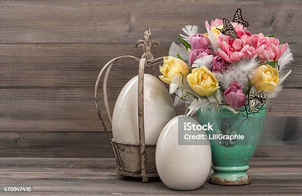 Pastel Colored Tulip Flowers With Vintage Easter Eggs Decoration Stock Photo - Download Image Now