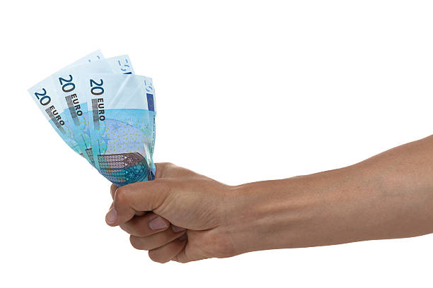 istock Hand holding out Euro bills 470047746