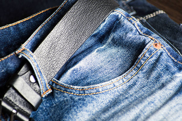 istock Detail of nice blue jeans with leather belt 470047848