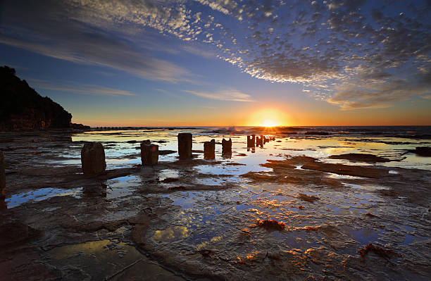 istock Sunrise, Reflections and silhouettes Coledale rockshelf 470050564