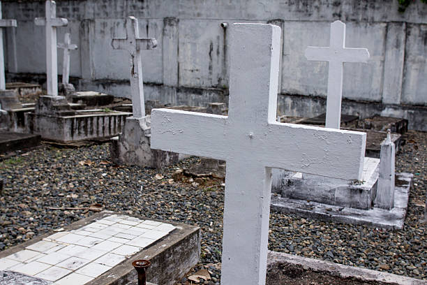 istock Graves with crosses in a abandoned cemetery 470051298