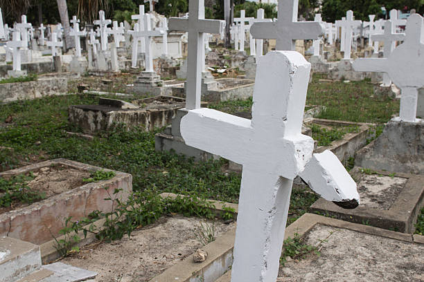 istock Graves with crosses in a abandoned cemetery 470051842