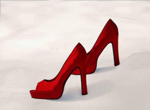 istock Red Velvet Stilettos On Snow 470051894