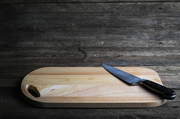 istock knife fork and napkin plaid  a cutting board wooden background 470054122