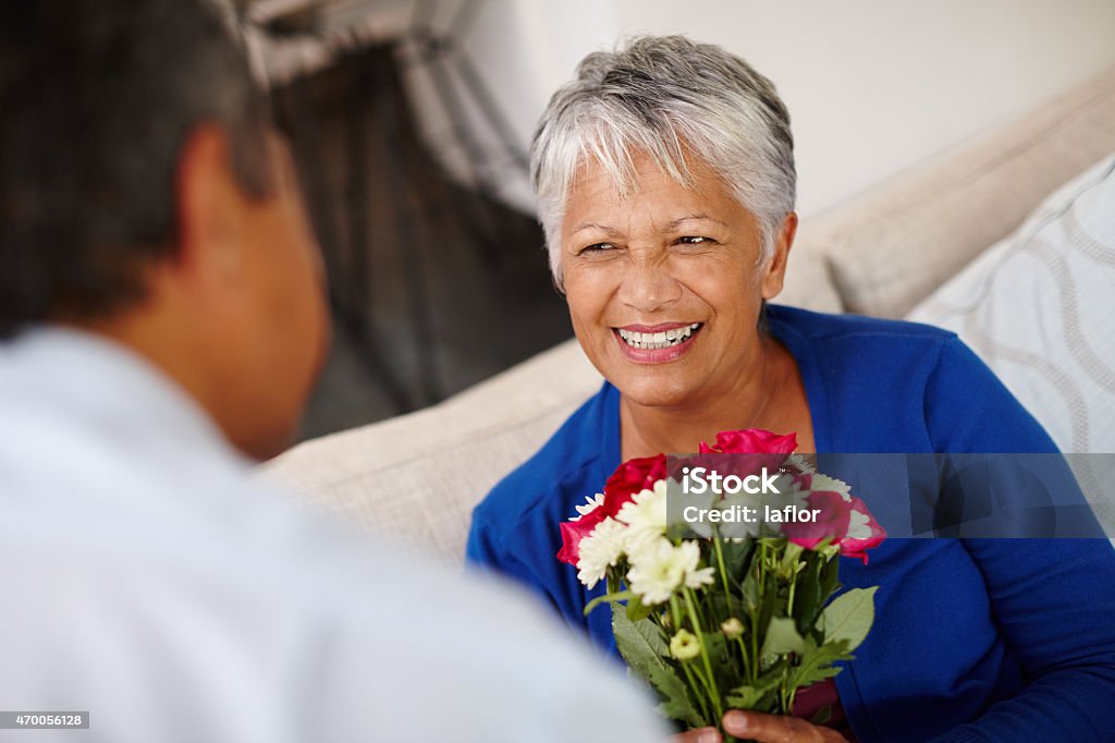 Flowers for my special lady Shot of a happy senior woman receiving a bunch of flowers from her husbandhttp://195.154.178.81/DATA/i_collage/pu/shoots/790860.jpg Bouquet Stock Photo