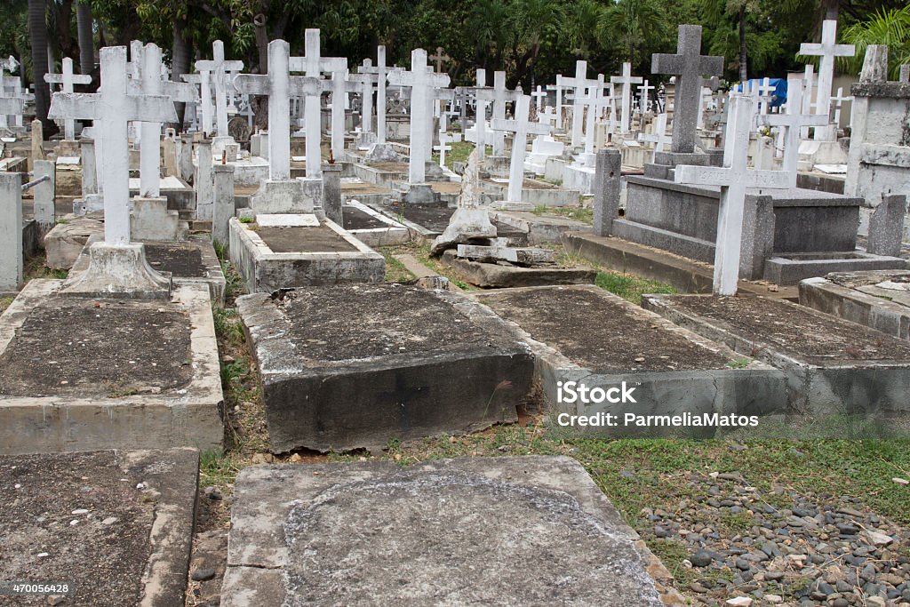 Graves with crosses in a abandoned cemetery Graves with crosses in a cemetery abandoned at Dominican Republic 2015 Stock Photo