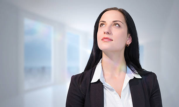 istock Composite image of pretty businesswoman looking up 470056790