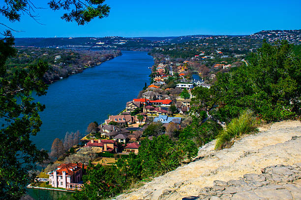 Mount Bonnell Iconic Landmark View Over Austin Mount Bonnell Iconic Landmark View over Austin amazing fine arts photography by Roschetzky. The Colorado river is in view and all the most expensive houses and most sought after land in all of Central Texas.  texas mountains stock pictures, royalty-free photos & images