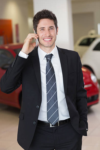 istock Smiling businessman calling with his mobile phone 470065902