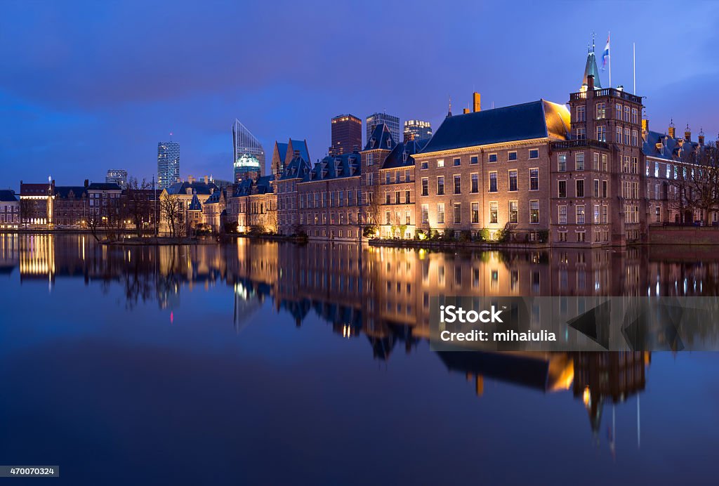 The Hague Skyline Panorama The Hague (Den Haag) Skyline with Binnenhof Palace, Mauritshuis Museum, and modern skyscrapers at night, The Netherlands. 2015 Stock Photo