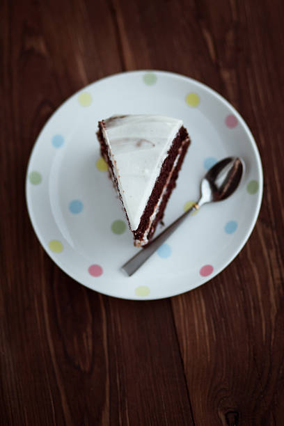 istock Chocolate cake in white plate on wooden table 470070666