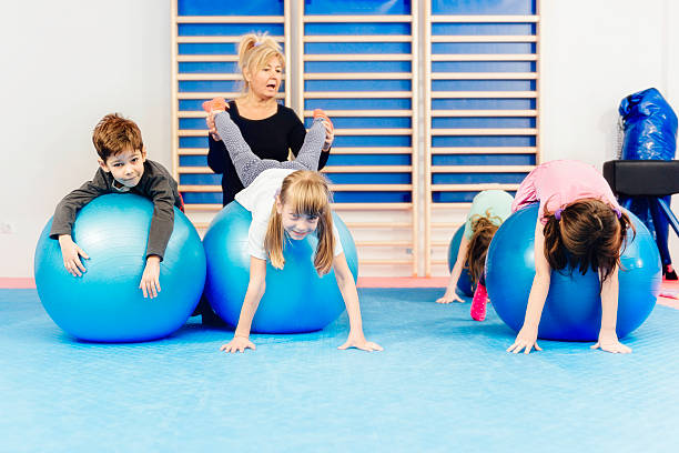 istock Group of children at physical education class 470070678