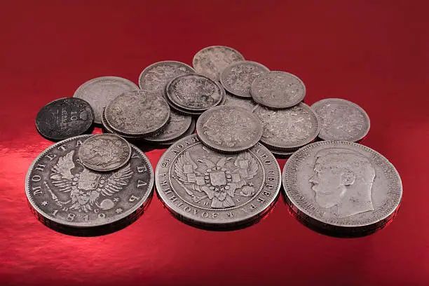 Photo of old silver on red