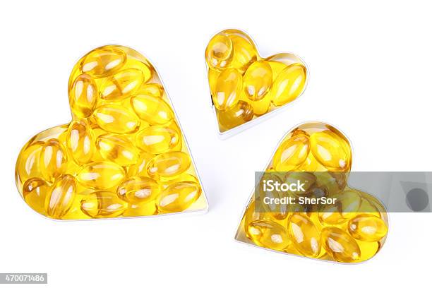 Vitamin Capsules In Shape Of Heart Stock Photo - Download Image Now - 2015, Anti Aging, Balance