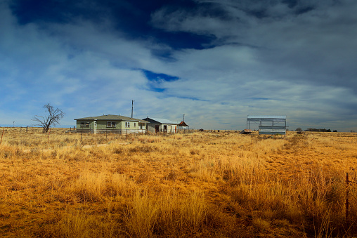 An abandoned farm and house in West Texas