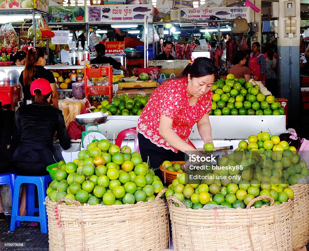 Life of Vietnamese vendors in Saigon Saigon, Vietnam - February 17, 2013: Life of Vietnamese vendors at small market in Ho Chi Minh city (Saigon), Vietnam. 2015 Stock Photo