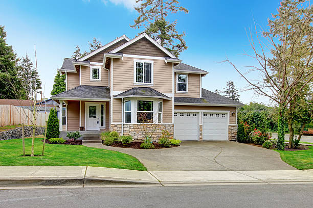 istock Beautiful beige siding house with stoned base 470078403