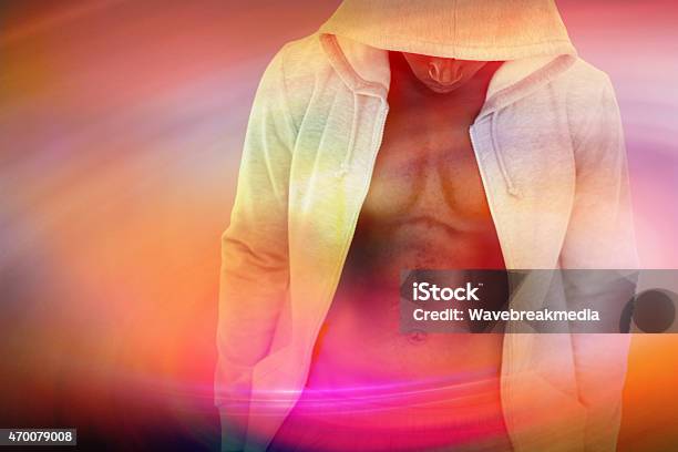 Composite Image Of Muscular Man Stock Photo - Download Image Now - 20-29 Years, 2015, 25-29 Years