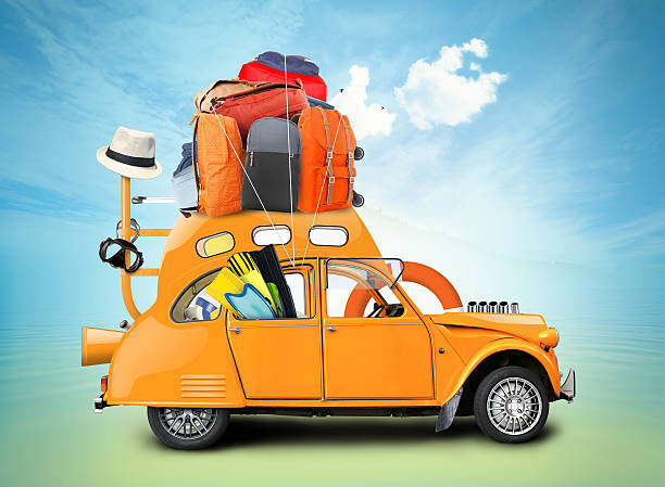 istock A yellow car packed for traveling 470079196