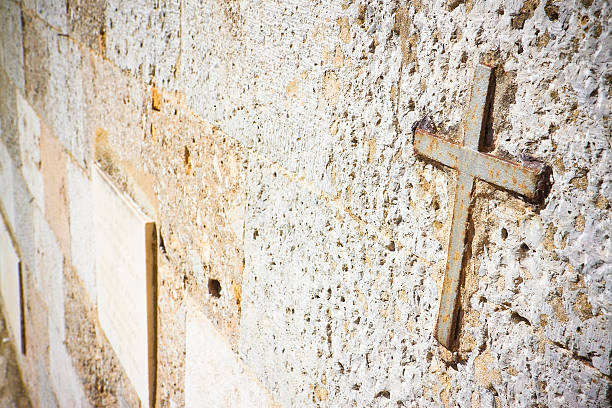 Iron cross snuggled in stone