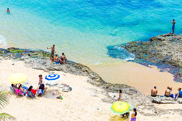Bahia, Brazil - November 15, 2014: People enjoy a sunny day at Boa Viagem Beach in Bahia, Brazil.
