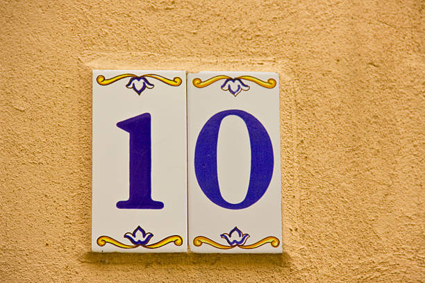 istock Number ten in a ceramic tile on street 470083718