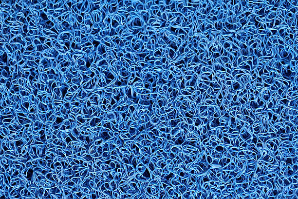 istock Blue carpet texture or door mat for background. 470083938