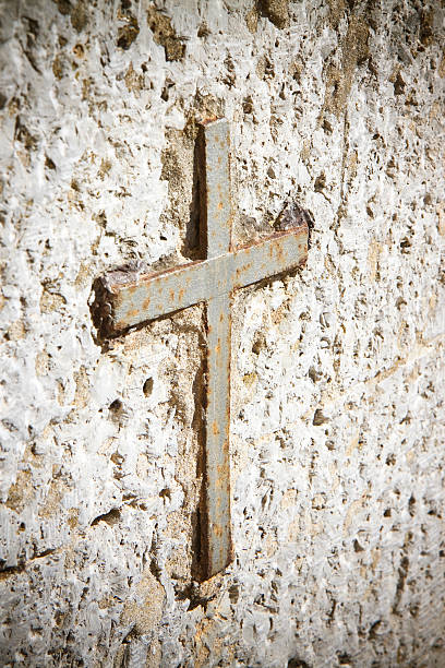 istock Iron cross snuggled in stone 470083962