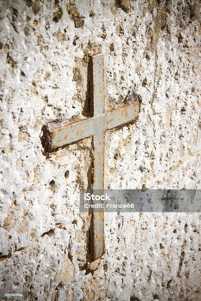 Iron cross snuggled in stone Iron cross snuggled in stone with copy space 2015 Stock Photo