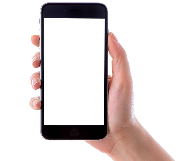 Hand holding iPhone 6 Plus on white background İstanbul, Turkey - April 9, 2014: Woman hand holding an Apple iPhone 6 Plus displaying blank white screen. The iPhone 6 Plus is a touchscreen smartphone developed by Apple Inc. iphone hand stock pictures, royalty-free photos & images