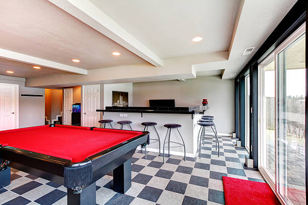 istock Elegant entertainment room with pool, bar and fireplace 470086527