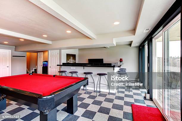 Elegant Entertainment Room With Pool Bar And Fireplace Stock Photo - Download Image Now